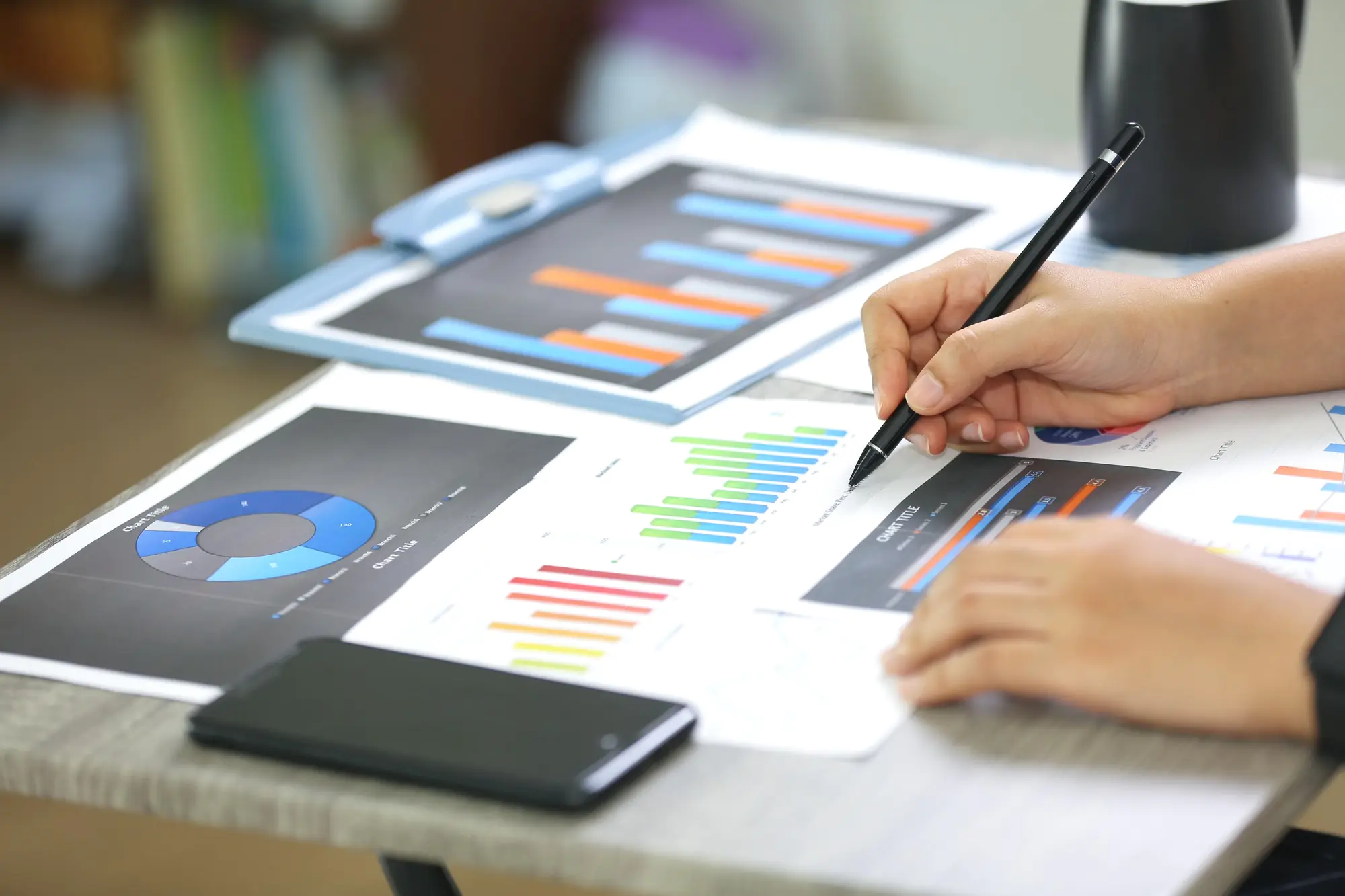 marketing-charts-and-data-paper-work-on-table